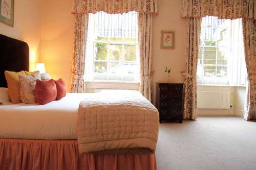 Imagen de la habitación del Hotel The Windsor Townhouse. Foto 5