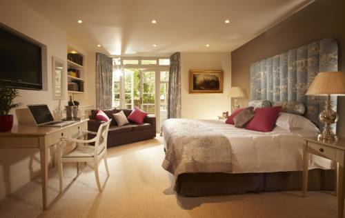 Imagen de la habitación del Hotel The Windsor Townhouse. Foto 6