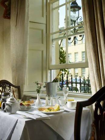 Imagen del bar/restaurante del Hotel The Windsor Townhouse. Foto 4