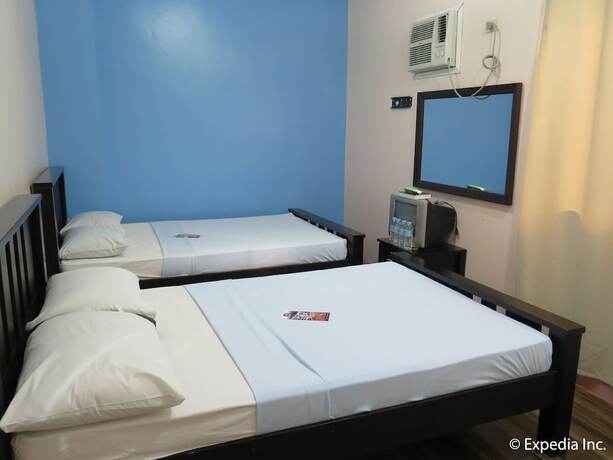 Imagen de la habitación del Hotel The Windy Ridge Inn. Foto 13