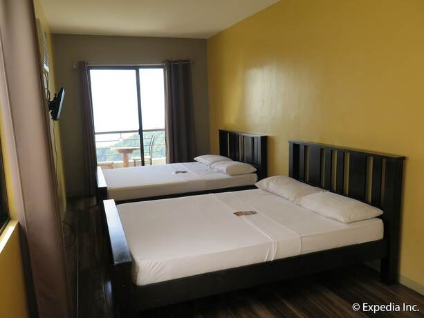Imagen de la habitación del Hotel The Windy Ridge Inn. Foto 18