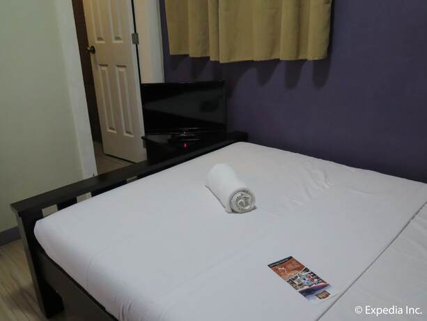 Imagen de la habitación del Hotel The Windy Ridge Inn. Foto 19