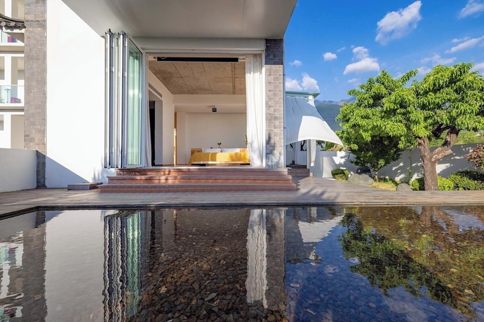 Imagen de la habitación del Hotel The Windyard Kazan Onsen-Private Hot Spring Bathtub close to South Gate of Dali Ancient Town. Foto 10