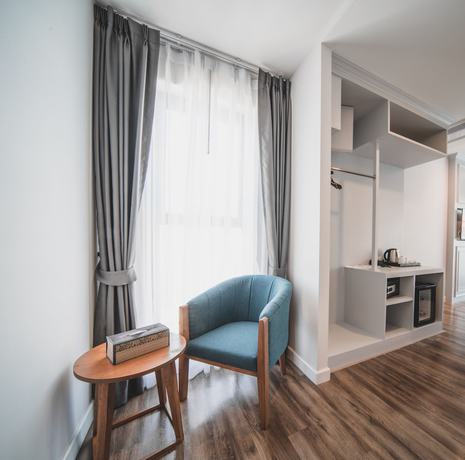 Imagen de la habitación del Hotel The Wing Boutique. Foto 15