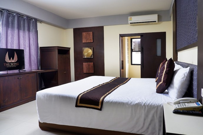 Imagen de la habitación del Hotel The Wing Design. Foto 19