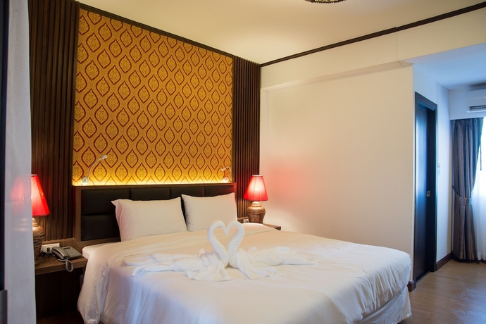 Imagen de la habitación del Hotel The Wing Lanna. Foto 5