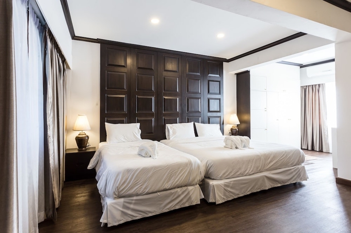 Imagen de la habitación del Hotel The Wing Lanna. Foto 6