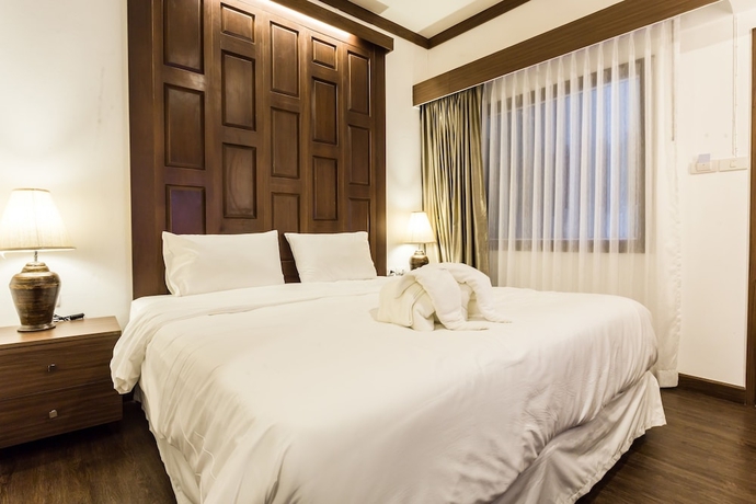 Imagen de la habitación del Hotel The Wing Lanna. Foto 11