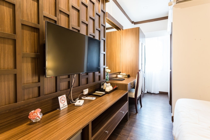 Imagen de la habitación del Hotel The Wing Lanna. Foto 12