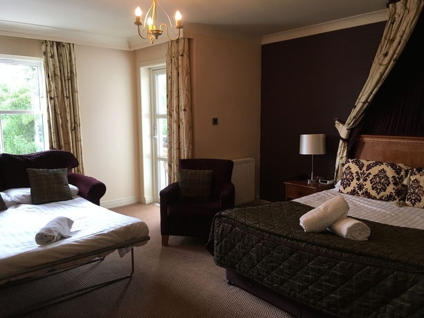 Imagen de la habitación del Hotel The Winnock Hotel. Foto 8