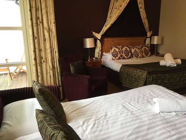 Imagen de la habitación del Hotel The Winnock Hotel. Foto 9