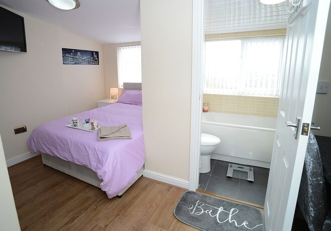 Imagen de la habitación del Hotel The Winter Garden Suites. Foto 15