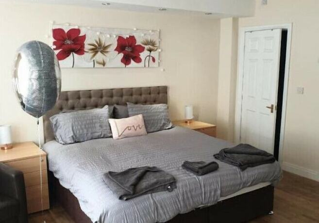 Imagen de la habitación del Hotel The Winter Garden Suites. Foto 16