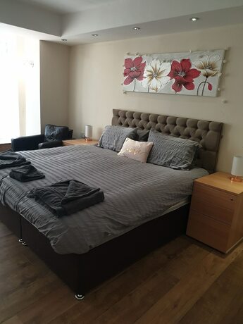 Imagen de la habitación del Hotel The Winter Garden Suites. Foto 17