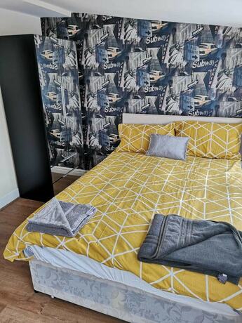 Imagen de la habitación del Hotel The Winter Garden Suites. Foto 18