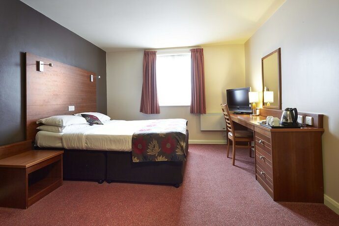 Imagen de la habitación del Hotel The Wishingwell. Foto 16