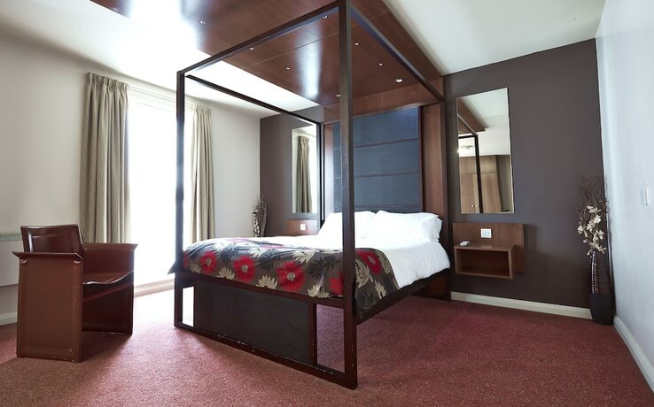 Imagen de la habitación del Hotel The Wishingwell. Foto 17