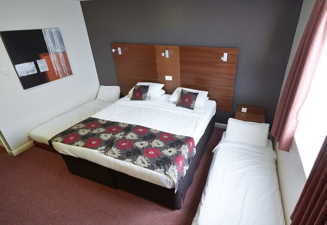 Imagen de la habitación del Hotel The Wishingwell. Foto 18