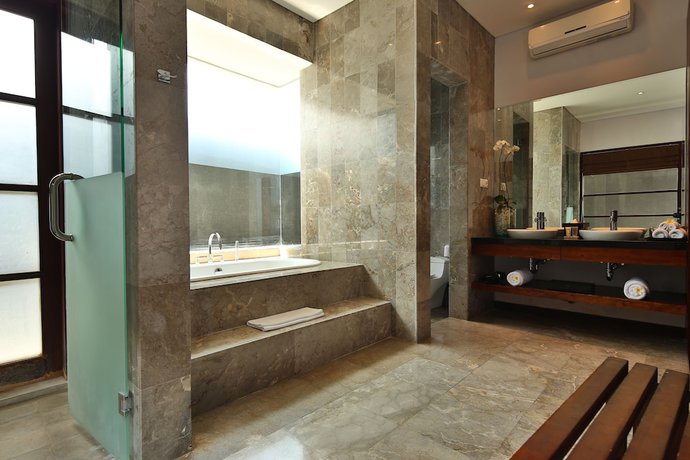 Imagen de la habitación del Hotel The Wolas Villa and Spa. Foto 11