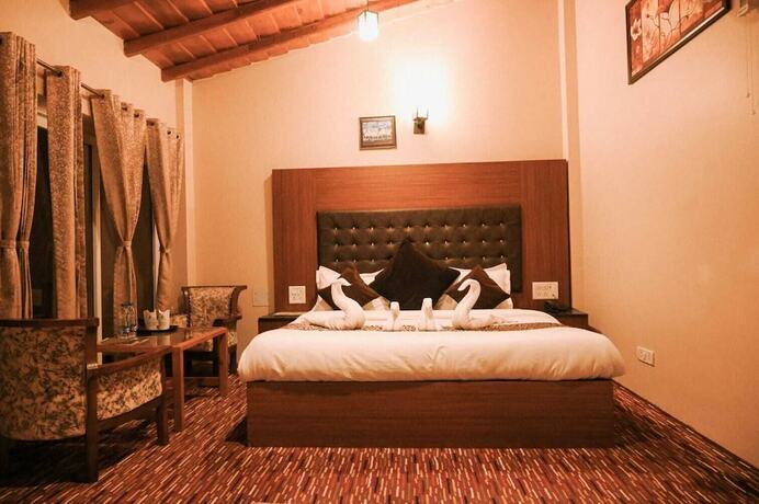 Imagen de la habitación del Hotel The Wonder Valley Resort. Foto 15