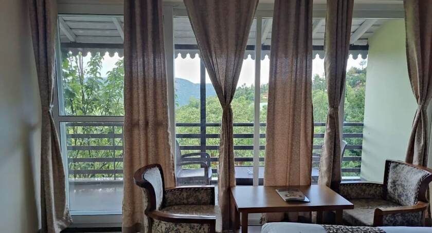 Imagen de la habitación del Hotel The Wonder Valley Resort. Foto 18