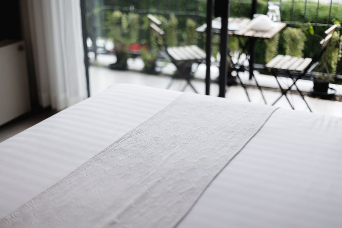 Imagen de la habitación del Hotel The Wood. Foto 15