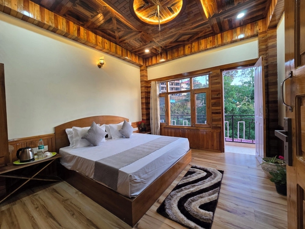 Imagen de la habitación del Hotel The Wooden Nook Chail. Foto 2
