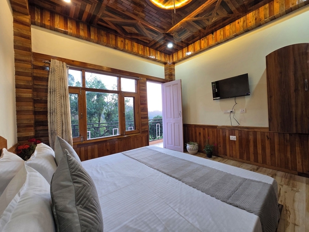 Imagen de la habitación del Hotel The Wooden Nook Chail. Foto 7
