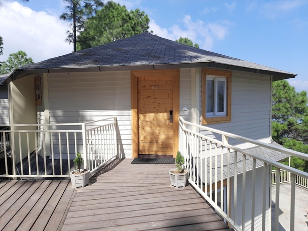 Imagen de la habitación del Hotel The Woods Retreat. Foto 2