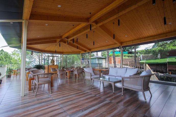 Imagen de los interiores del Hotel The Woods Retreat. Foto 18