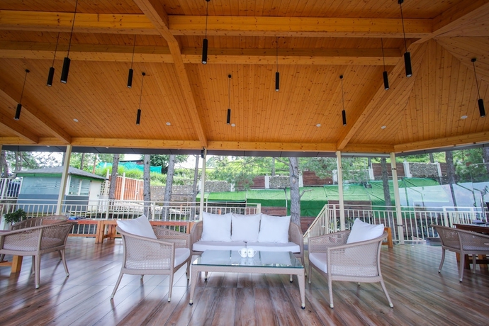 Imagen de los interiores del Hotel The Woods Retreat. Foto 19