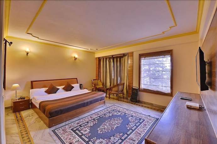 Imagen de la habitación del Hotel The Woodstock Resort. Foto 8