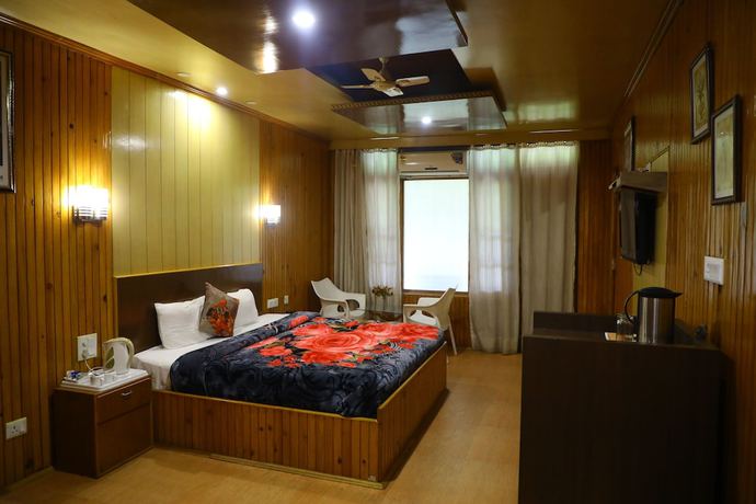 Imagen de la habitación del Hotel The Woodz. Foto 2