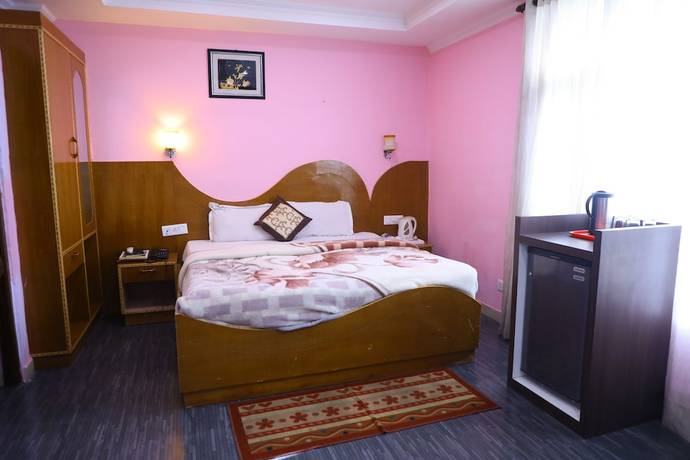 Imagen de la habitación del Hotel The Woodz. Foto 3