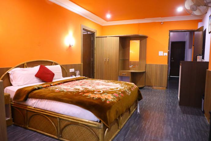 Imagen de la habitación del Hotel The Woodz. Foto 5