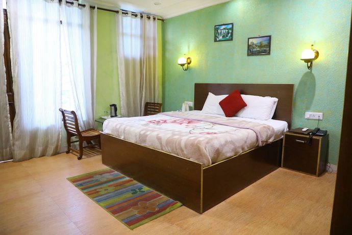 Imagen de la habitación del Hotel The Woodz. Foto 6