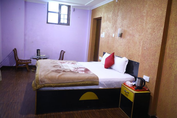 Imagen de la habitación del Hotel The Woodz. Foto 7