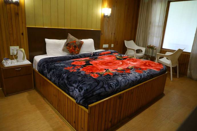 Imagen de la habitación del Hotel The Woodz. Foto 10