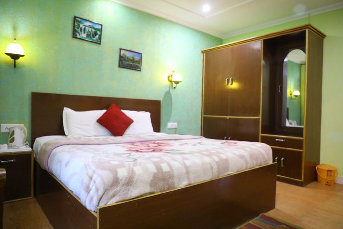 Imagen de la habitación del Hotel The Woodz. Foto 11