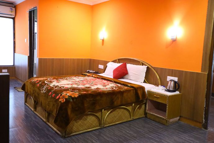 Imagen de la habitación del Hotel The Woodz. Foto 14