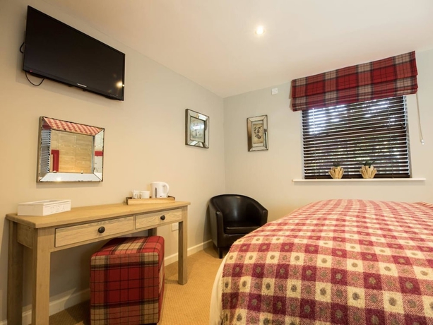 Imagen de la habitación del Hotel The Worlds End. Foto 11