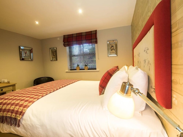 Imagen de la habitación del Hotel The Worlds End. Foto 16