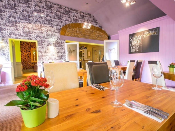 Imagen del bar/restaurante del Hotel The Worlds End. Foto 2