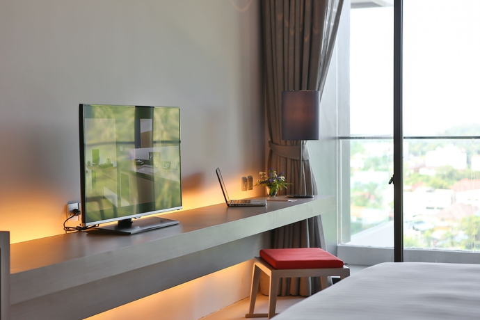 Imagen de la habitación del Hotel The Yama Phuket. Foto 7