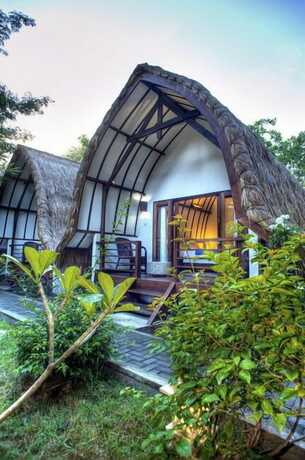 Imagen de la habitación del Hotel The Yoga Garden. Foto 18