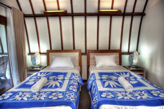 Imagen de la habitación del Hotel The Yoga Garden. Foto 19