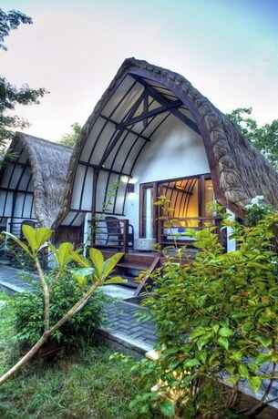 Imagen de la habitación del Hotel The Yoga Garden. Foto 20