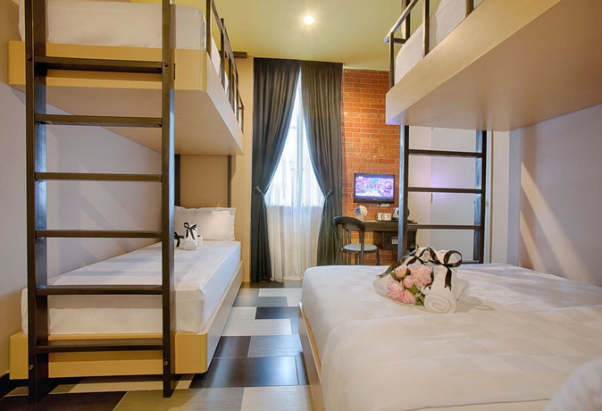 Imagen de la habitación del Hotel The Youniq. Foto 9