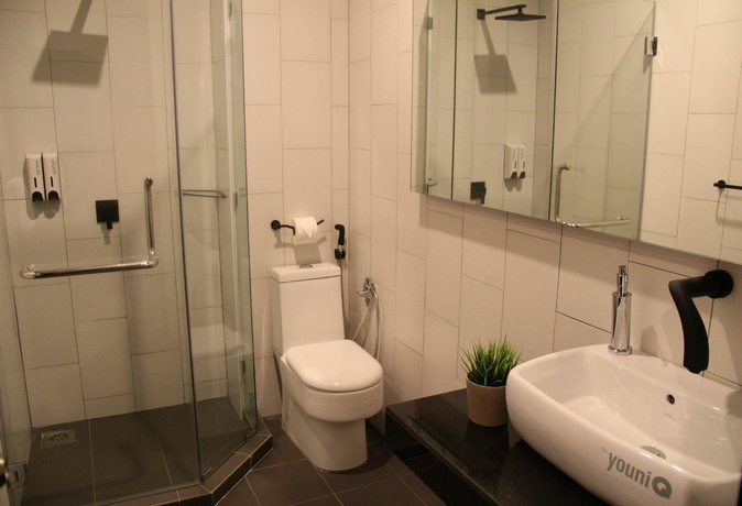 Imagen de la habitación del Hotel The Youniq. Foto 11