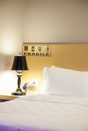 Imagen de la habitación del Hotel The Youniq. Foto 12